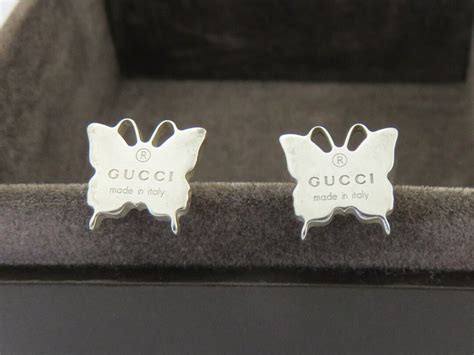 gucci sterling silver butterfly earrings.